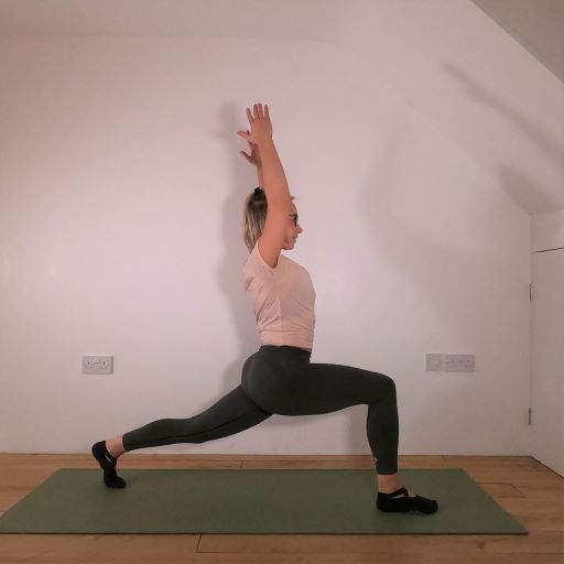 Pilates instructor demonstrating pilates exercise